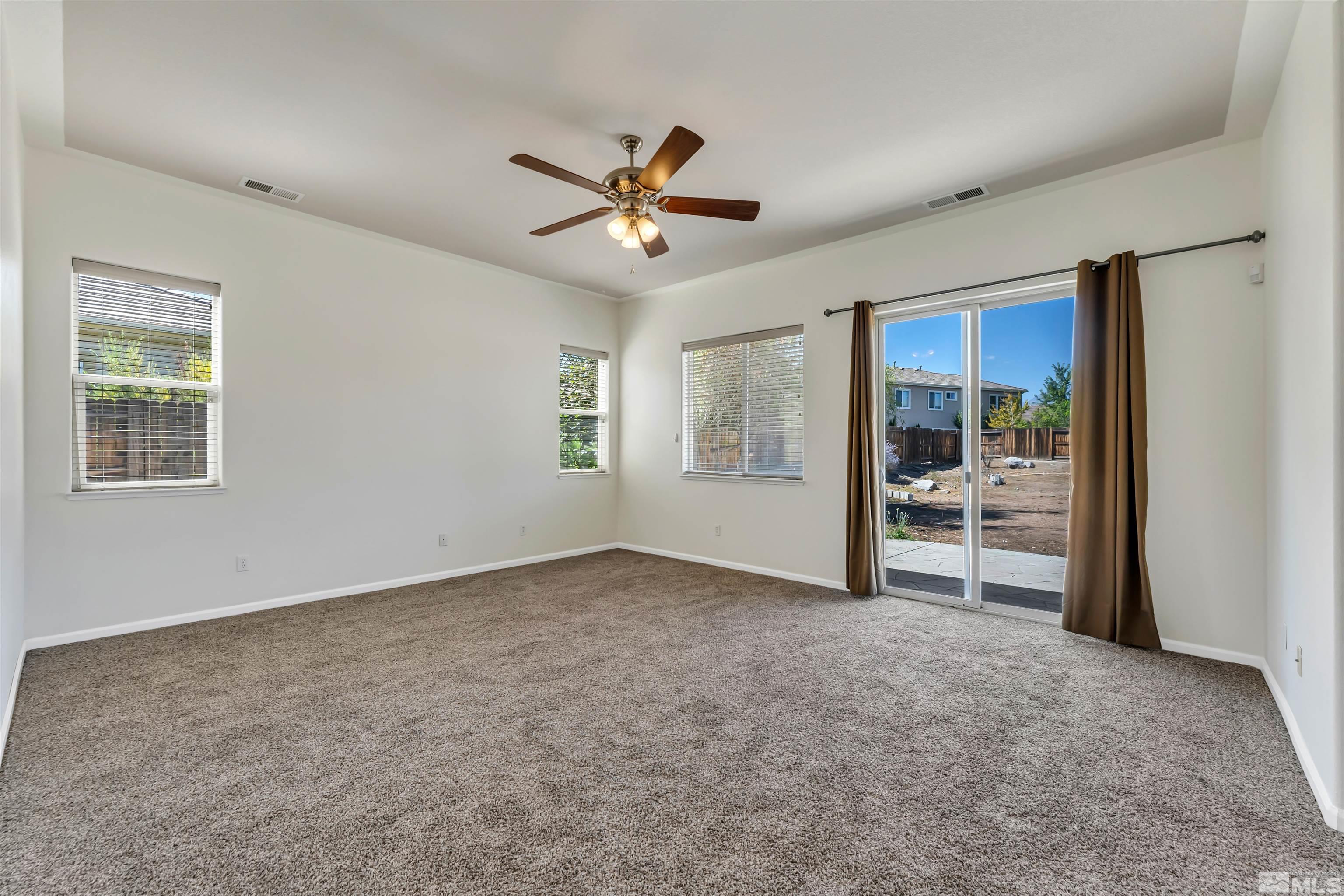 10555 Dillingham Drive Reno, NV 89521 - Photo 23 of 34 a view of empty room with cabinet and ceiling fan