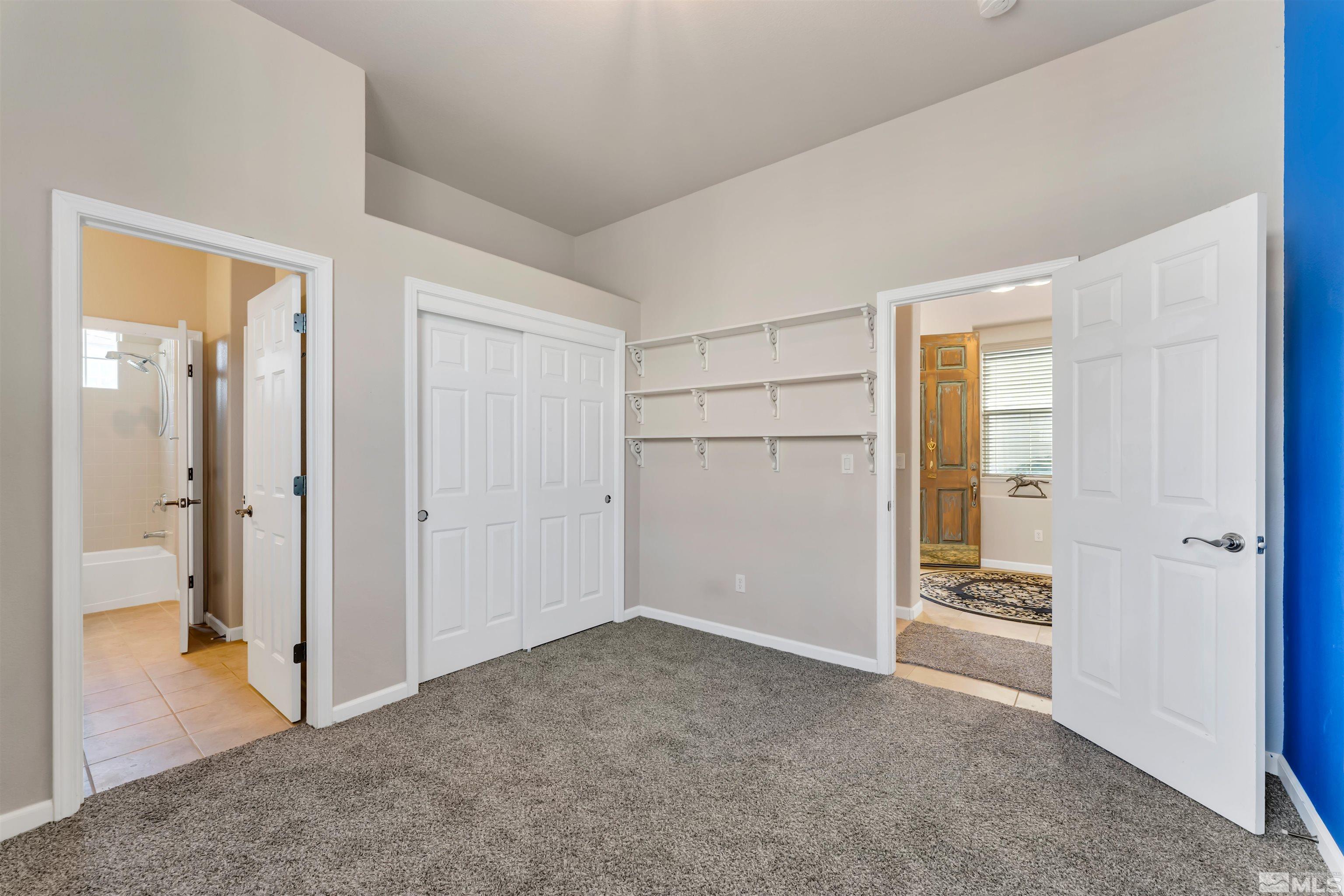 10555 Dillingham Drive Reno, NV 89521 - Photo 9 of 34 wooden floor and closet in a room