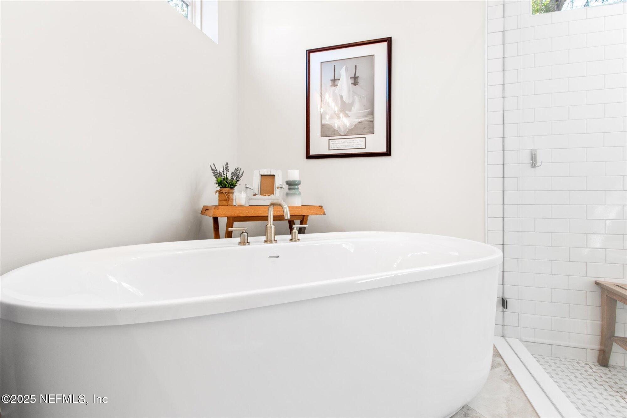 28341 Grandview Manor Yulee, FL 32097 - Photo 23 of 64 a white bath tub sitting next to a white toilet