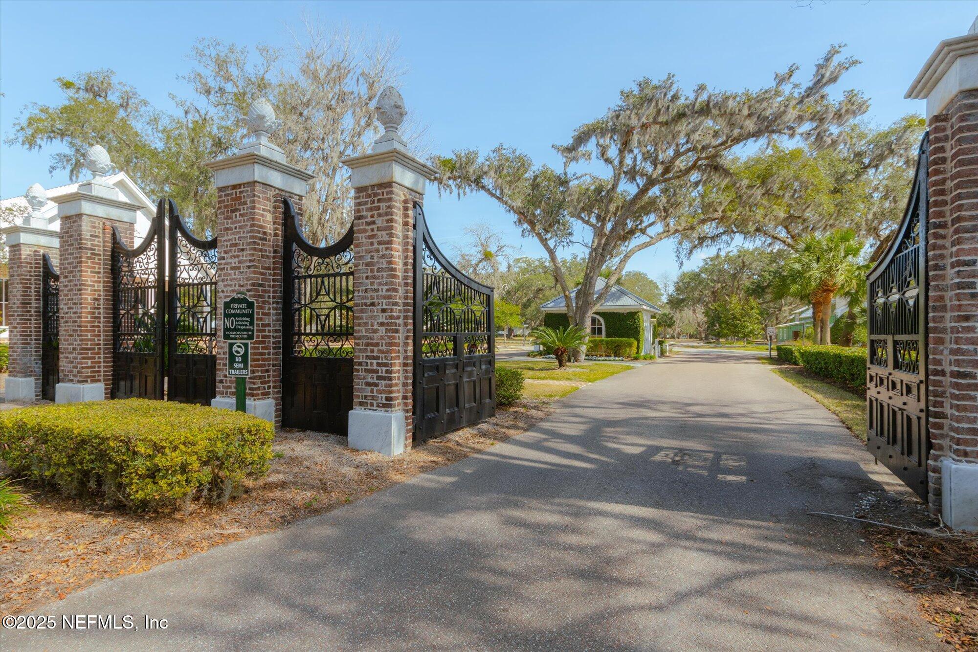 28341 Grandview Manor Yulee, FL 32097 - Photo 54 of 64 a view of a building with a street