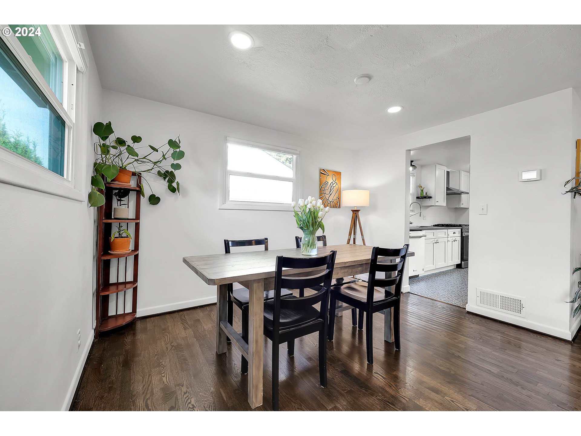 1617 Parnell Drive Eugene, OR 97404 - Photo 8 of 39 a view of a dining room with furniture and wooden floor