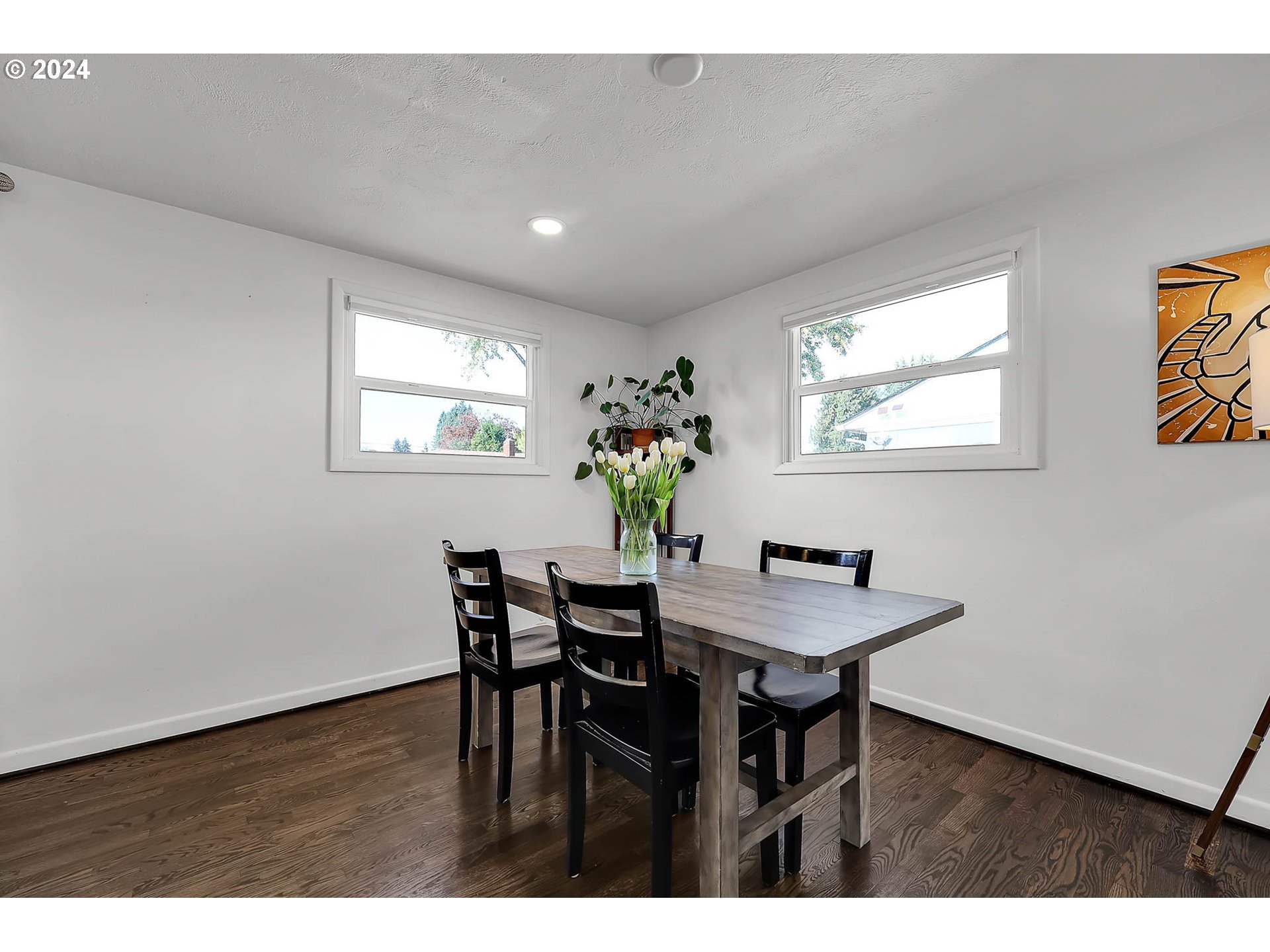 1617 Parnell Drive Eugene, OR 97404 - Photo 9 of 39 a view of a dining room with furniture and wooden floor