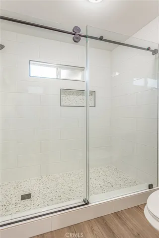 a view of a backyard with large trees