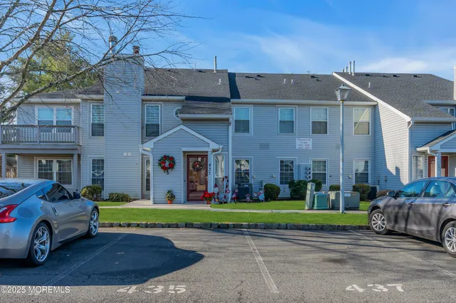 a view of a parked cars in front of a building