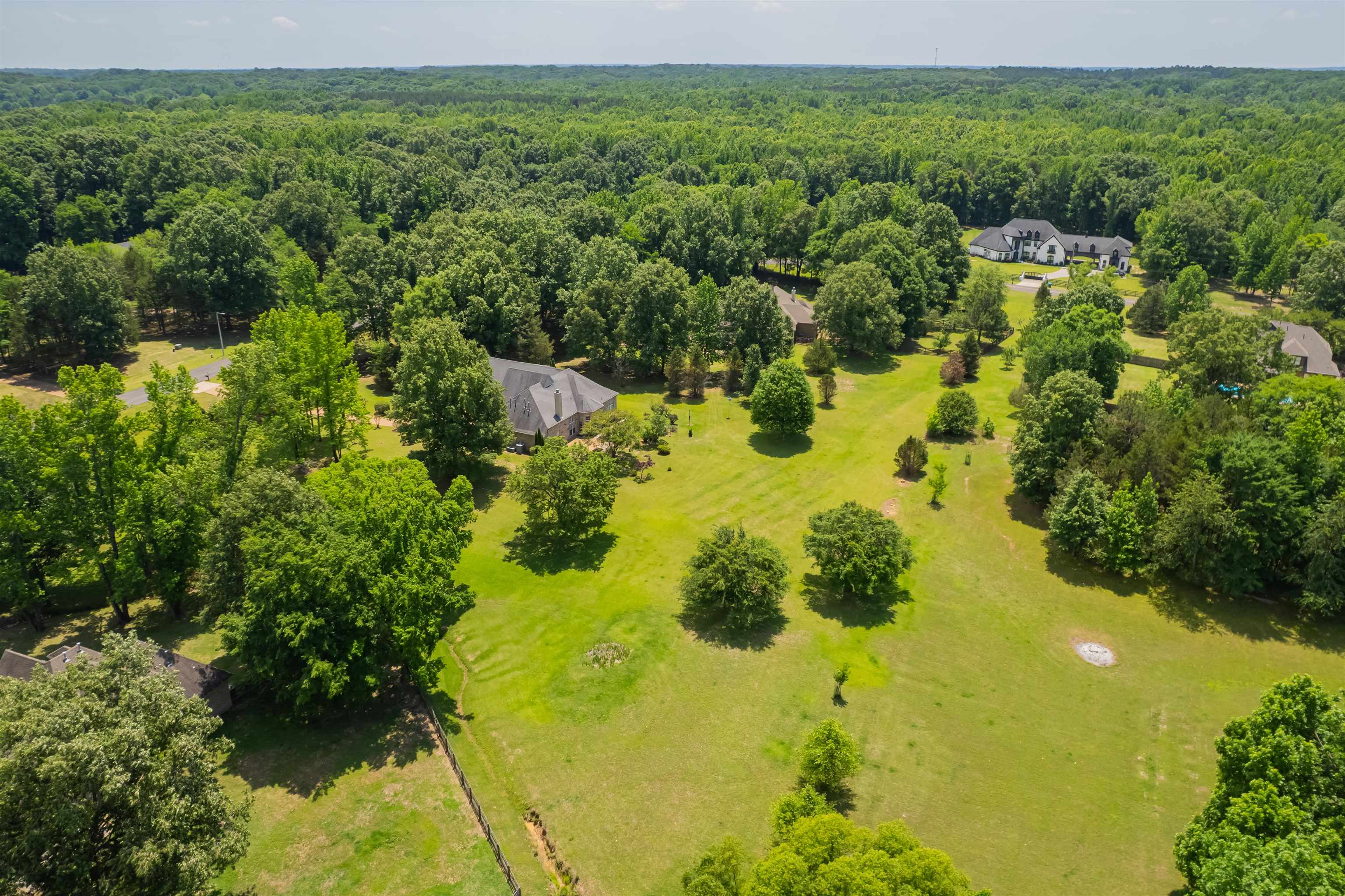 5035 Brian Ridge Road Arlington, TN 38002 - Photo 35 of 40 Expansive property featuring a large residence with a multi-gabled roof and surrounding green space