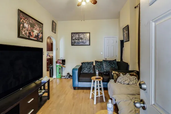 a view of a dining room with furniture and wooden floor