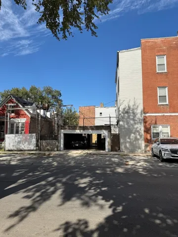 a view of room with window and wooden floor