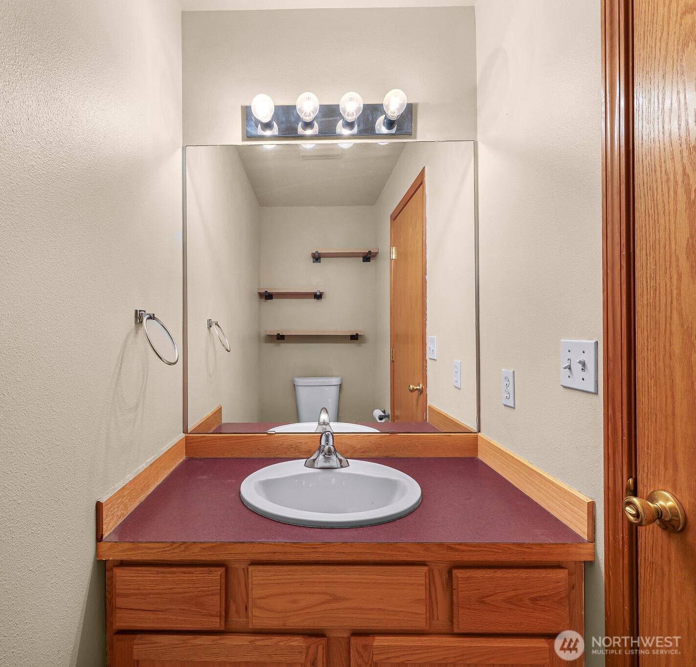18002 Tualco Road Monroe, WA 98272 - Photo 16 of 39 a bathroom with a sink and a mirror
