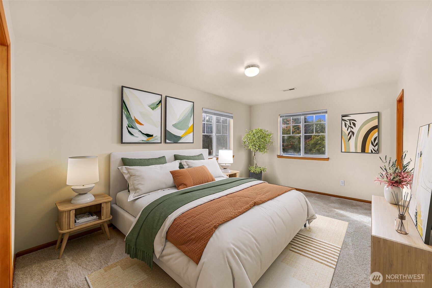 18002 Tualco Road Monroe, WA 98272 - Photo 18 of 39 a bedroom with a bed a painting and a window