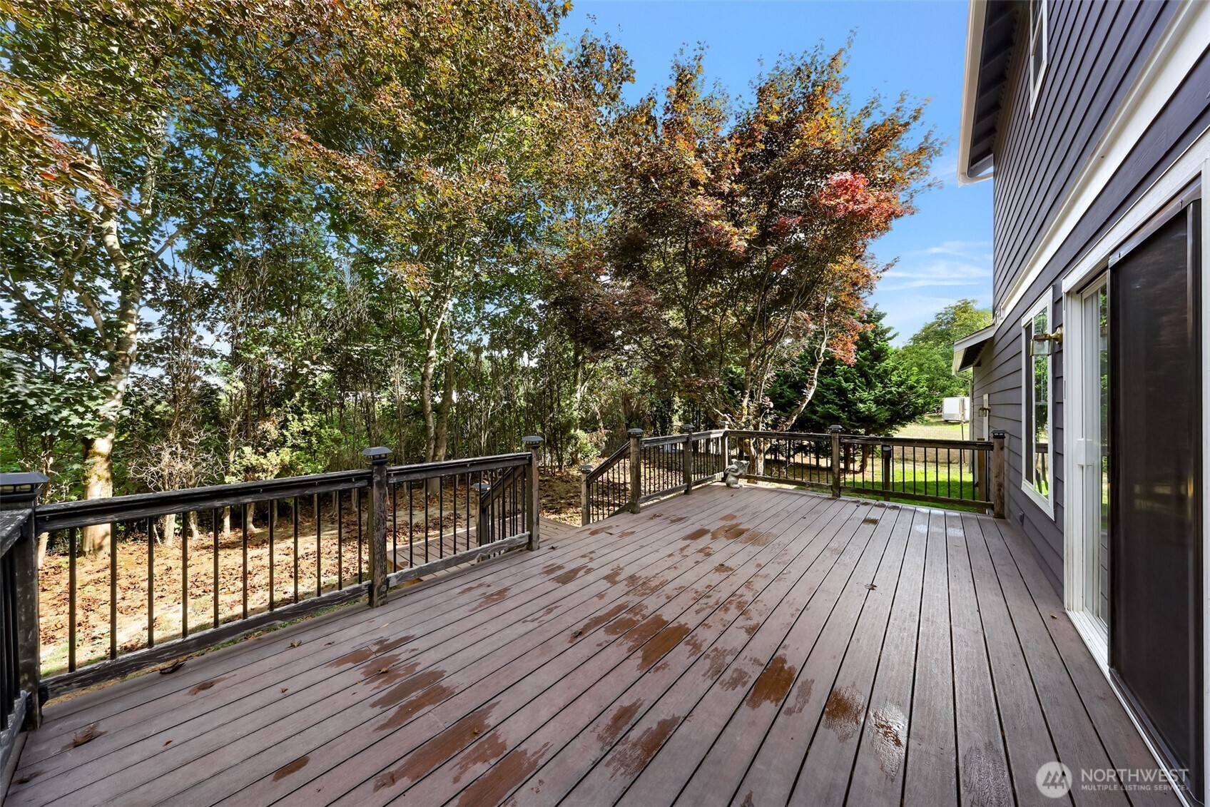 18002 Tualco Road Monroe, WA 98272 - Photo 30 of 39 a view of deck with wooden floor and outdoor seating