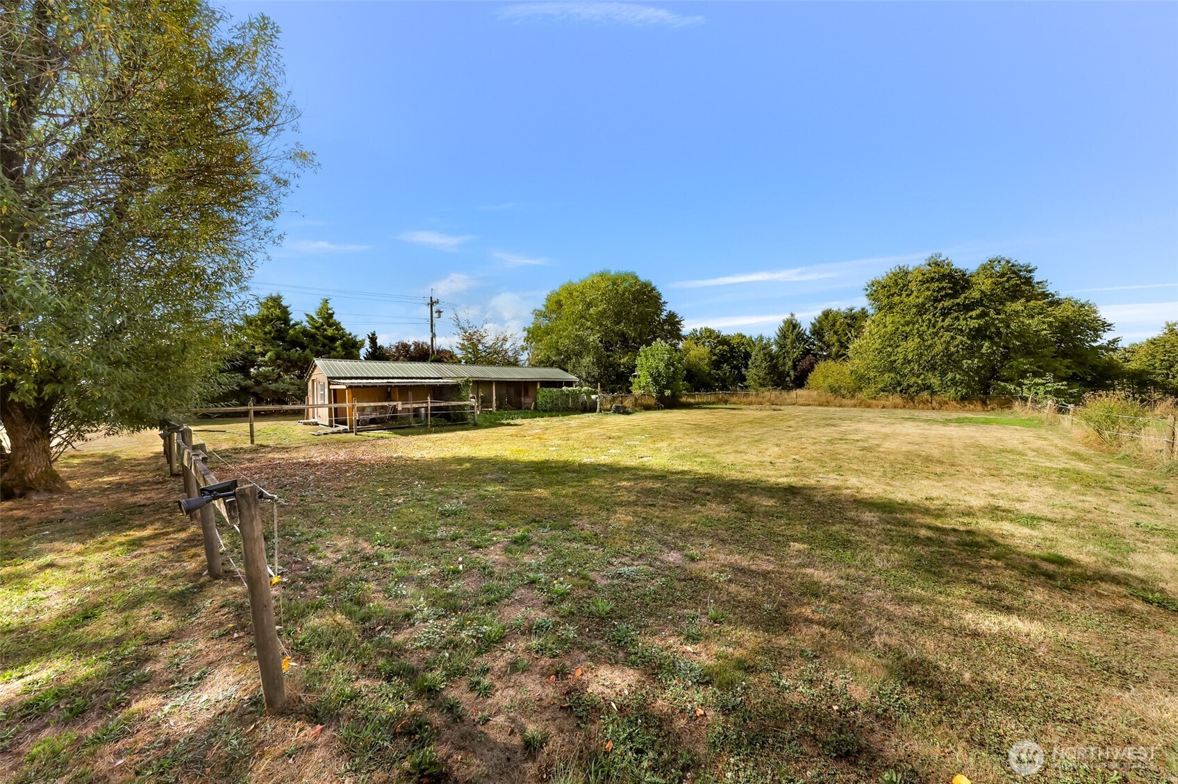 18002 Tualco Road Monroe, WA 98272 - Photo 33 of 39 a view of a lake with a yard