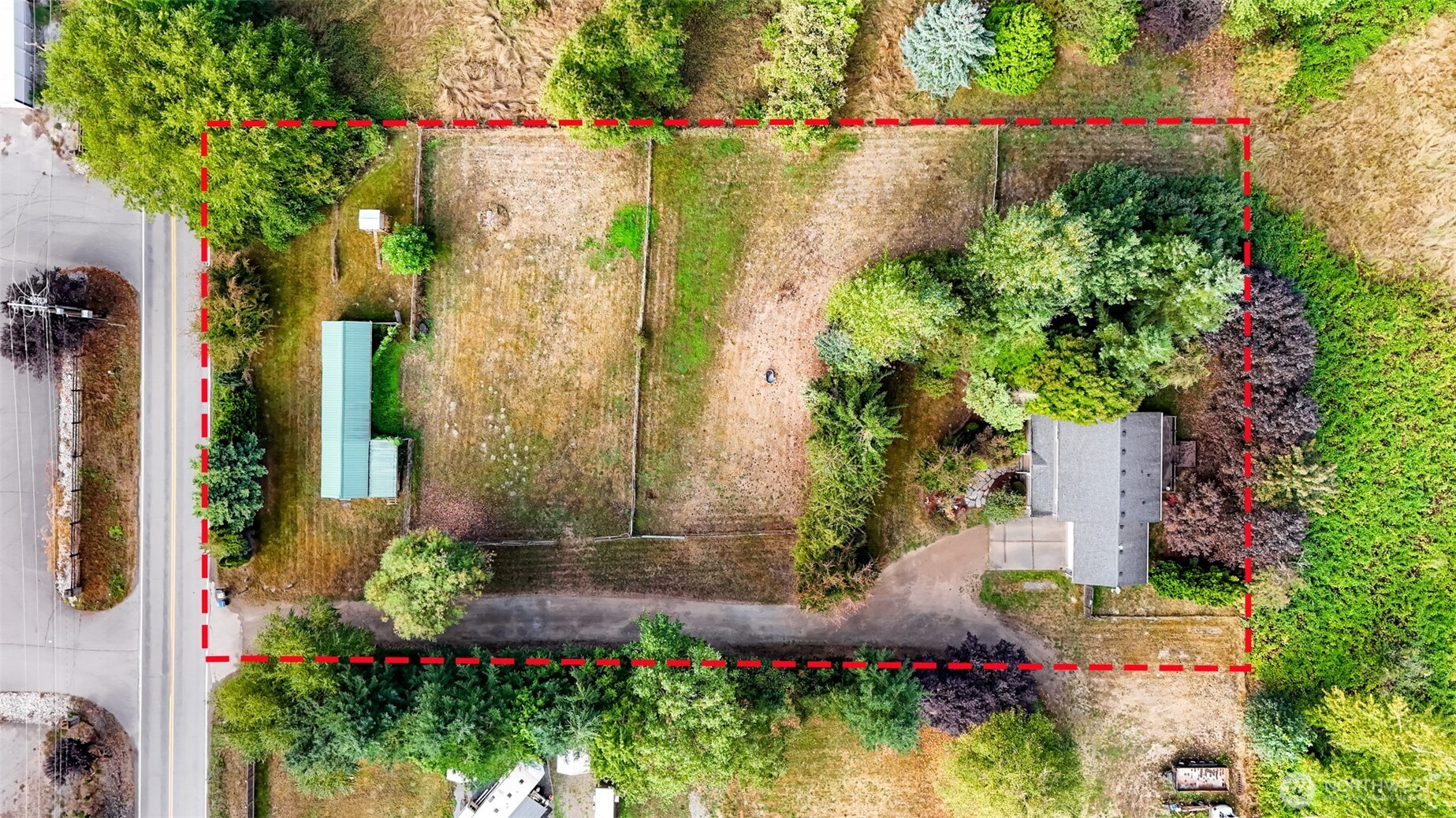 18002 Tualco Road Monroe, WA 98272 - Photo 34 of 39 front view of a house and a yard and flowers
