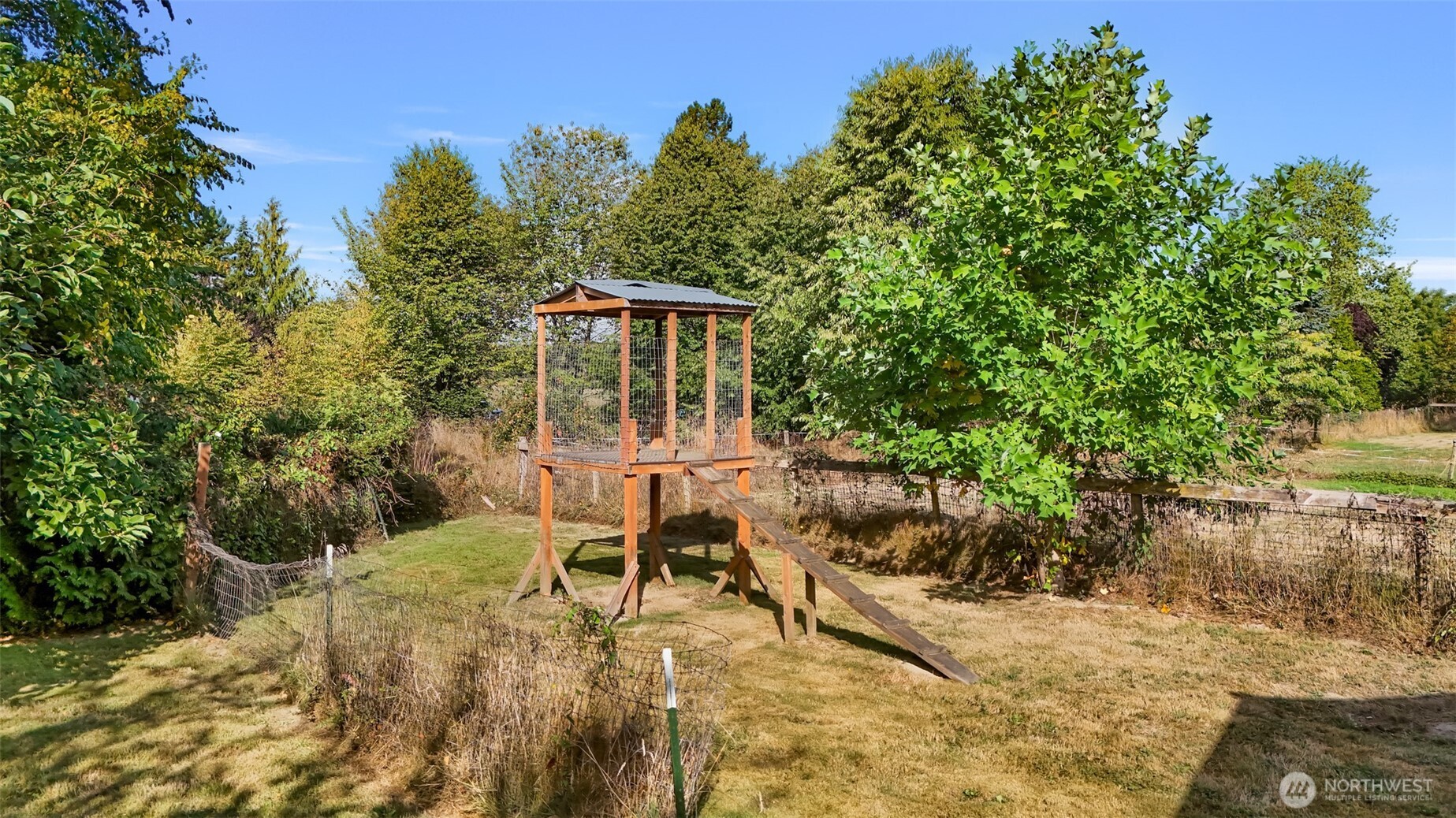 18002 Tualco Road Monroe, WA 98272 - Photo 37 of 39 a view of a backyard with sitting area