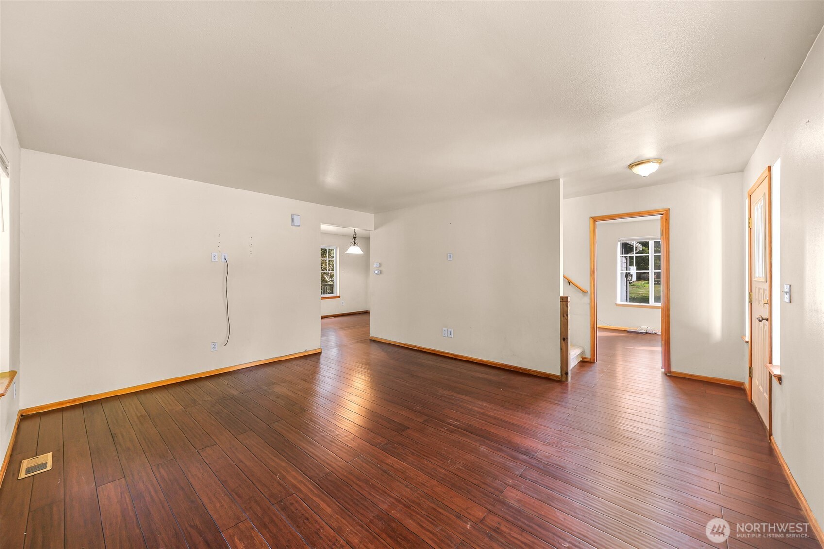 18002 Tualco Road Monroe, WA 98272 - Photo 7 of 39 a view of empty room with wooden floor