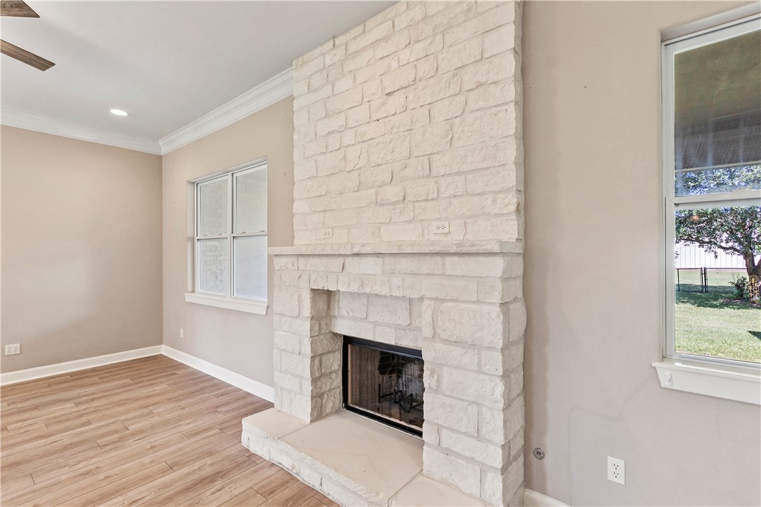 6701 Old Reliance Road Bryan, TX 77808 - Photo 7 of 44 a living room with a fireplace