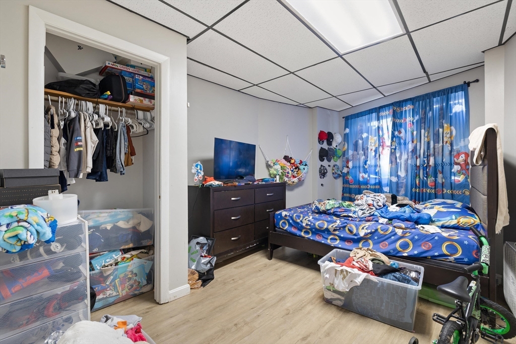 340 Harding Street Worcester, MA 01610 - Photo 11 of 42 a bedroom with furniture and a space