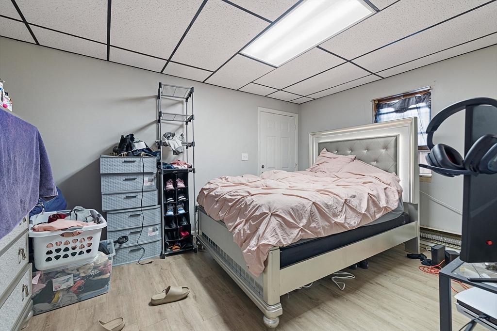 340 Harding Street Worcester, MA 01610 - Photo 12 of 42 a bedroom with a bed and a window