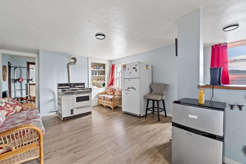 340 Harding Street Worcester, MA 01610 - Photo 18 of 42 a view of a workspace with furniture and workspace