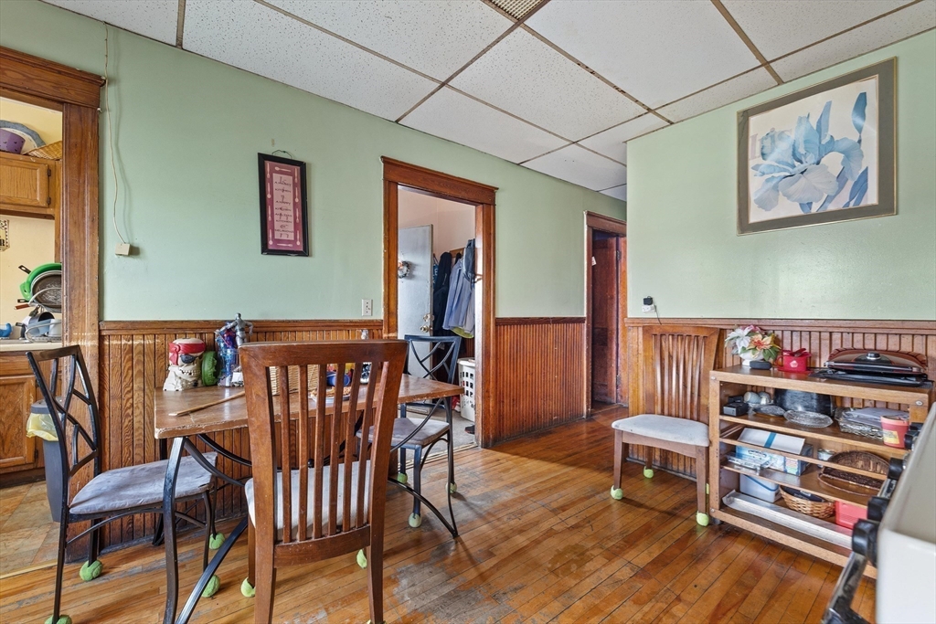 340 Harding Street Worcester, MA 01610 - Photo 27 of 42 a view of a dining room with furniture and wooden floor