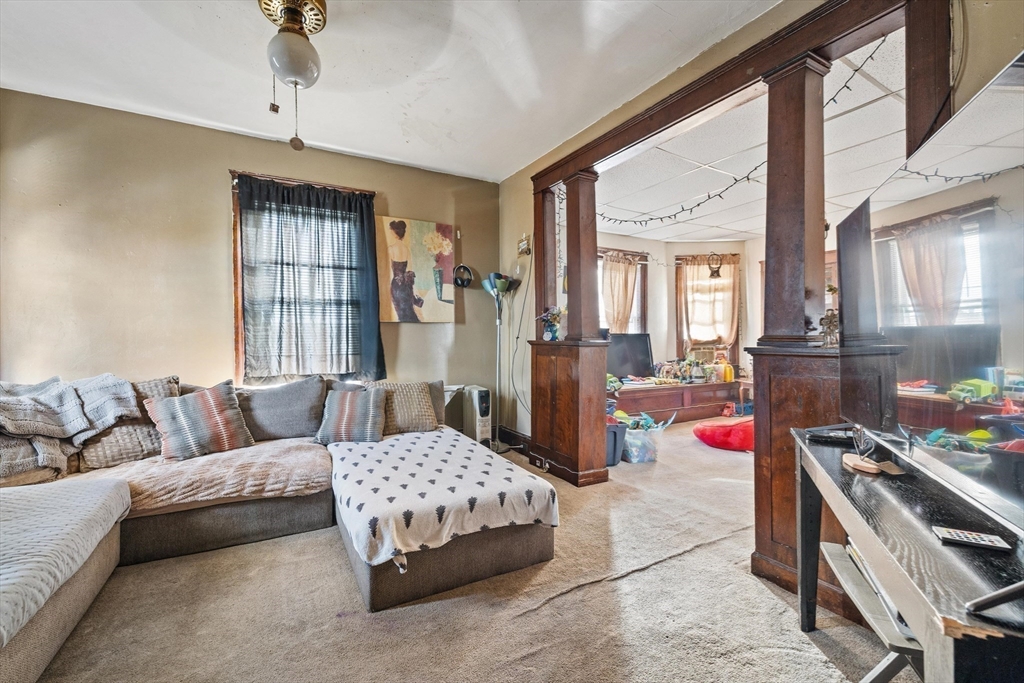340 Harding Street Worcester, MA 01610 - Photo 32 of 42 a living room with furniture and a couch