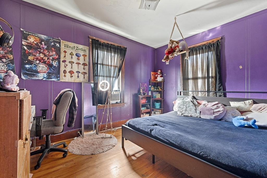 340 Harding Street Worcester, MA 01610 - Photo 34 of 42 a bedroom with a bed dresser and a window
