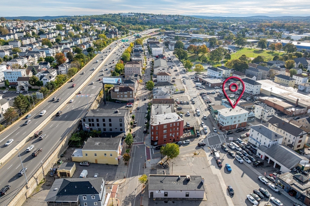 340 Harding Street Worcester, MA 01610 - Photo 6 of 42 an aerial view of residential houses with outdoor space