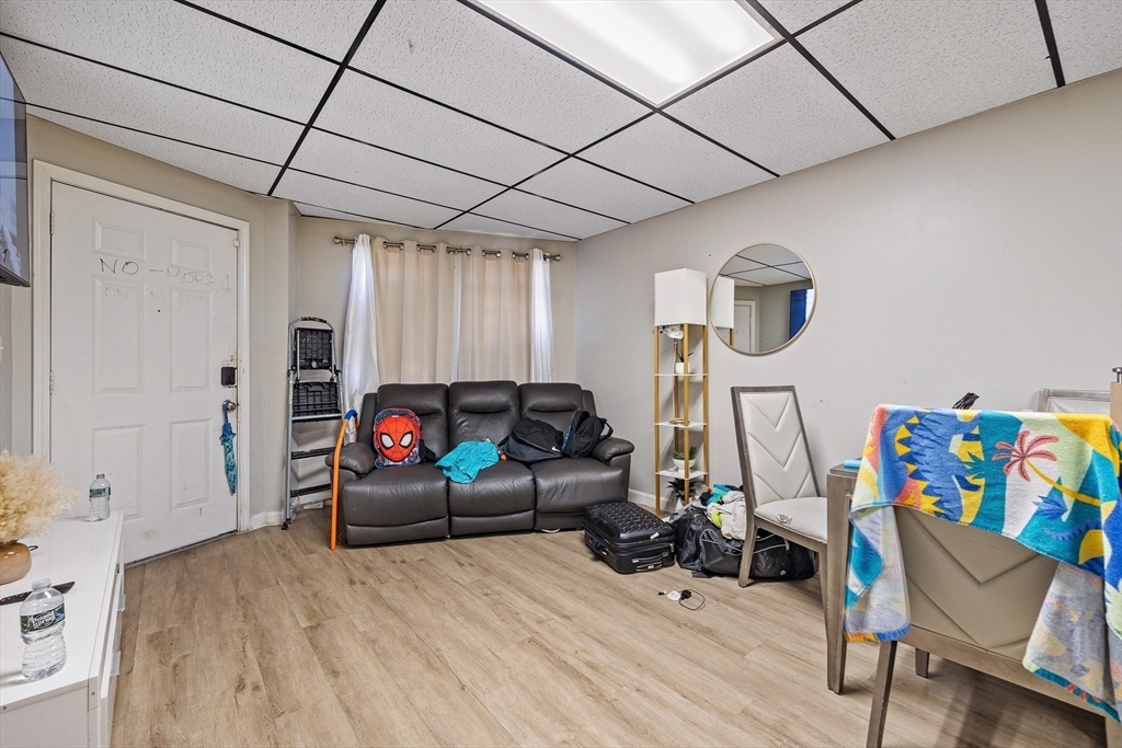 340 Harding Street Worcester, MA 01610 - Photo 9 of 42 a living room with furniture and a wooden floor