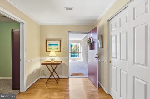 a view of a livingroom with furniture and a window