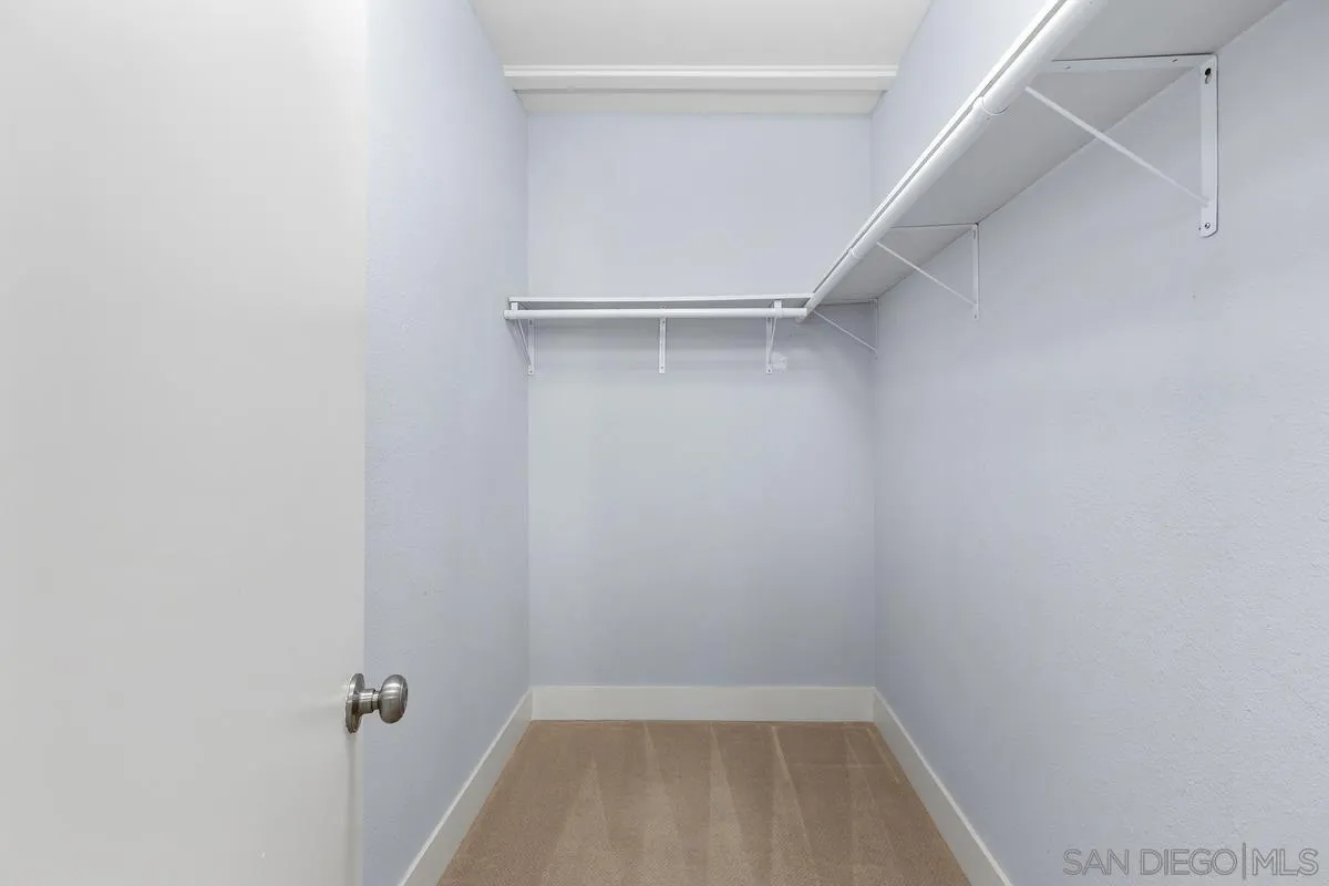 9956 Via Debbie Santee, CA 92071 - Photo 20 of 30 a view of a room with racks on the wall