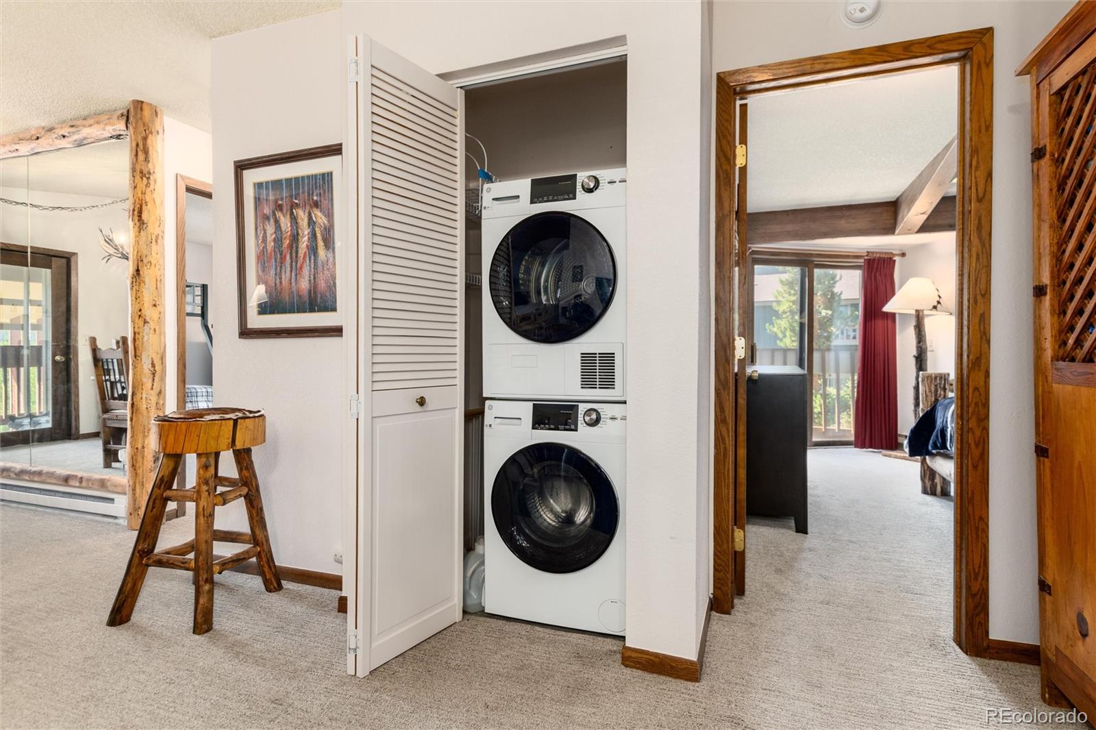 490 Kings Crossing Road, Unit 631633 Winter Park, CO 80482 - Photo 21 of 43 a utility room with dryer and washer