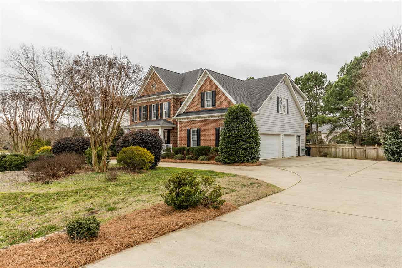 3705 Wesley Ridge Drive Apex, NC 27539 - Photo 30 of 30 This 3-car garage, also has a workbench. The circular drive is convenient, and frees up space around the in-ground basketball goal. 3-Car Garage