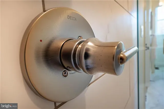 an aerial view of staircase with mirror