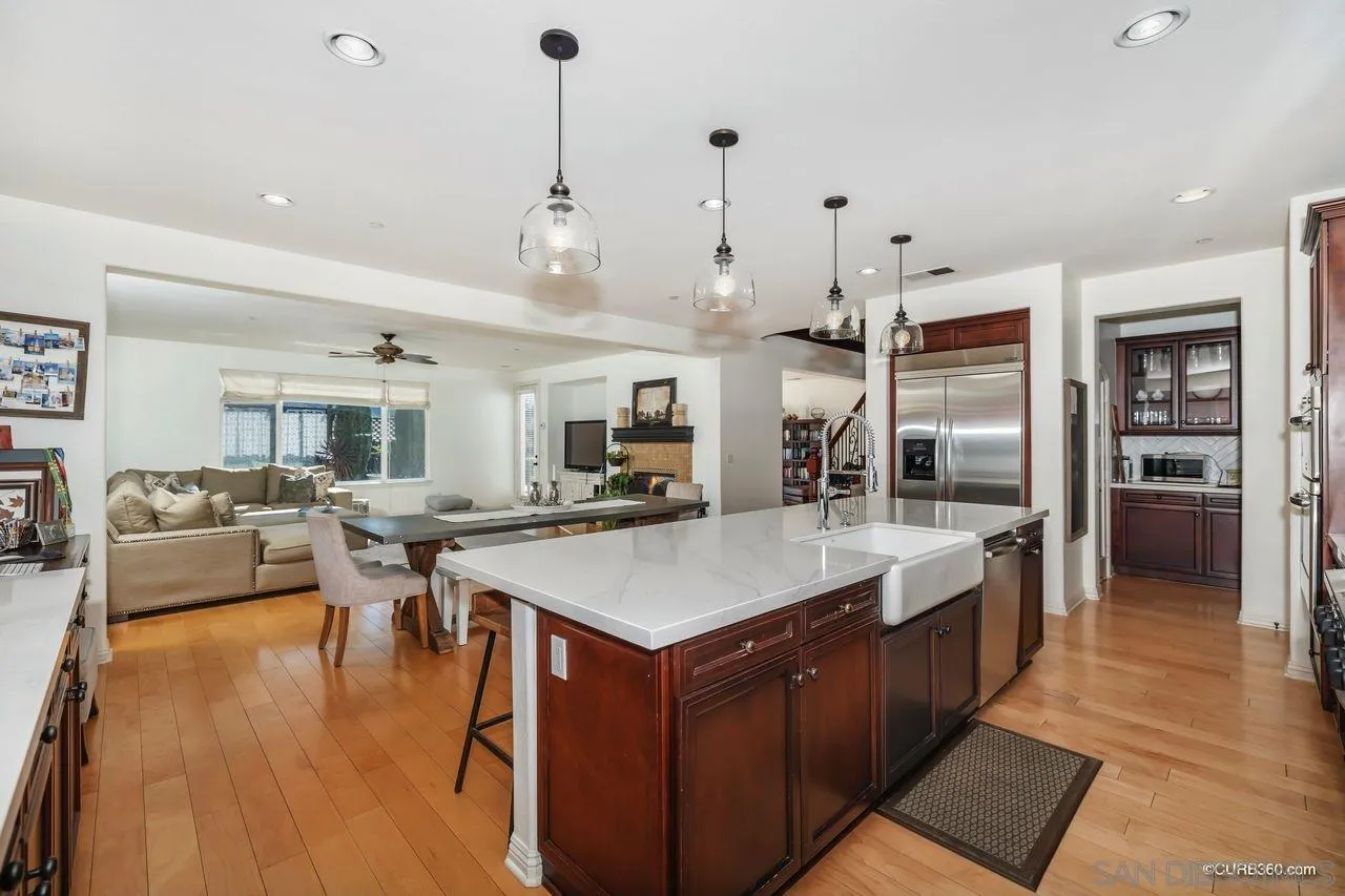 16029 Cayenne Ridge Road San Diego, CA 92127 - Photo 12 of 37 a large kitchen with lots of counter top space