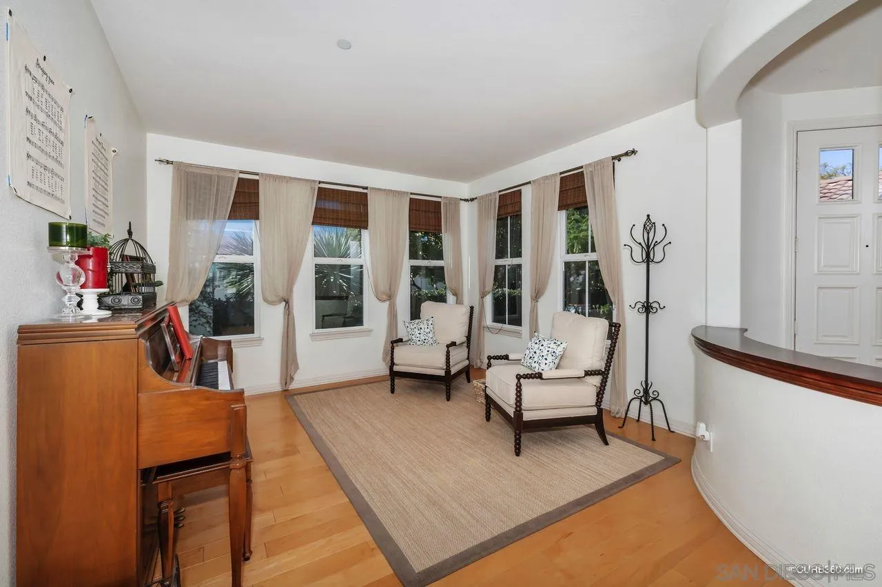 16029 Cayenne Ridge Road San Diego, CA 92127 - Photo 5 of 37 a living room with furniture and a potted plant