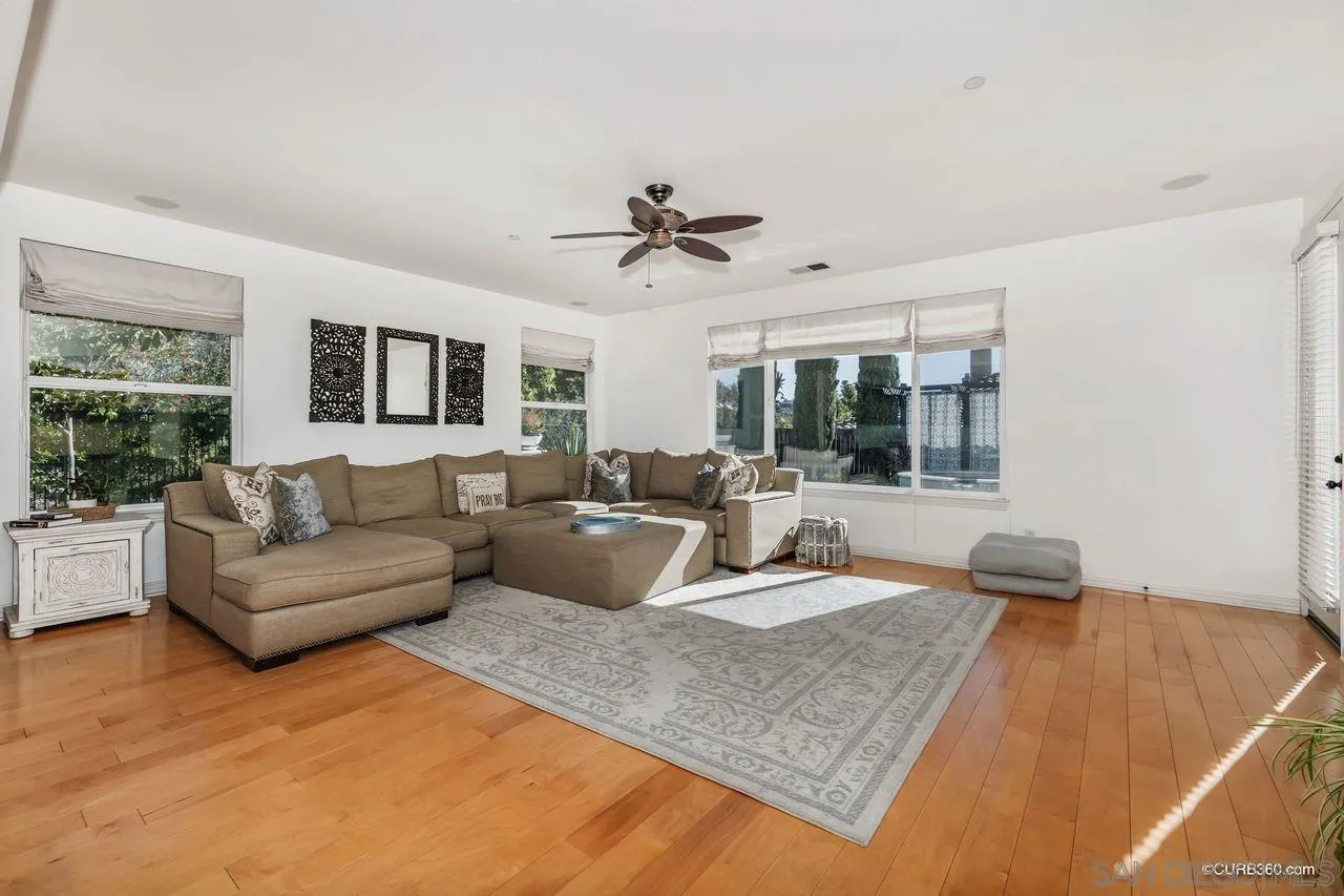 16029 Cayenne Ridge Road San Diego, CA 92127 - Photo 8 of 37 a living room with furniture and a large window