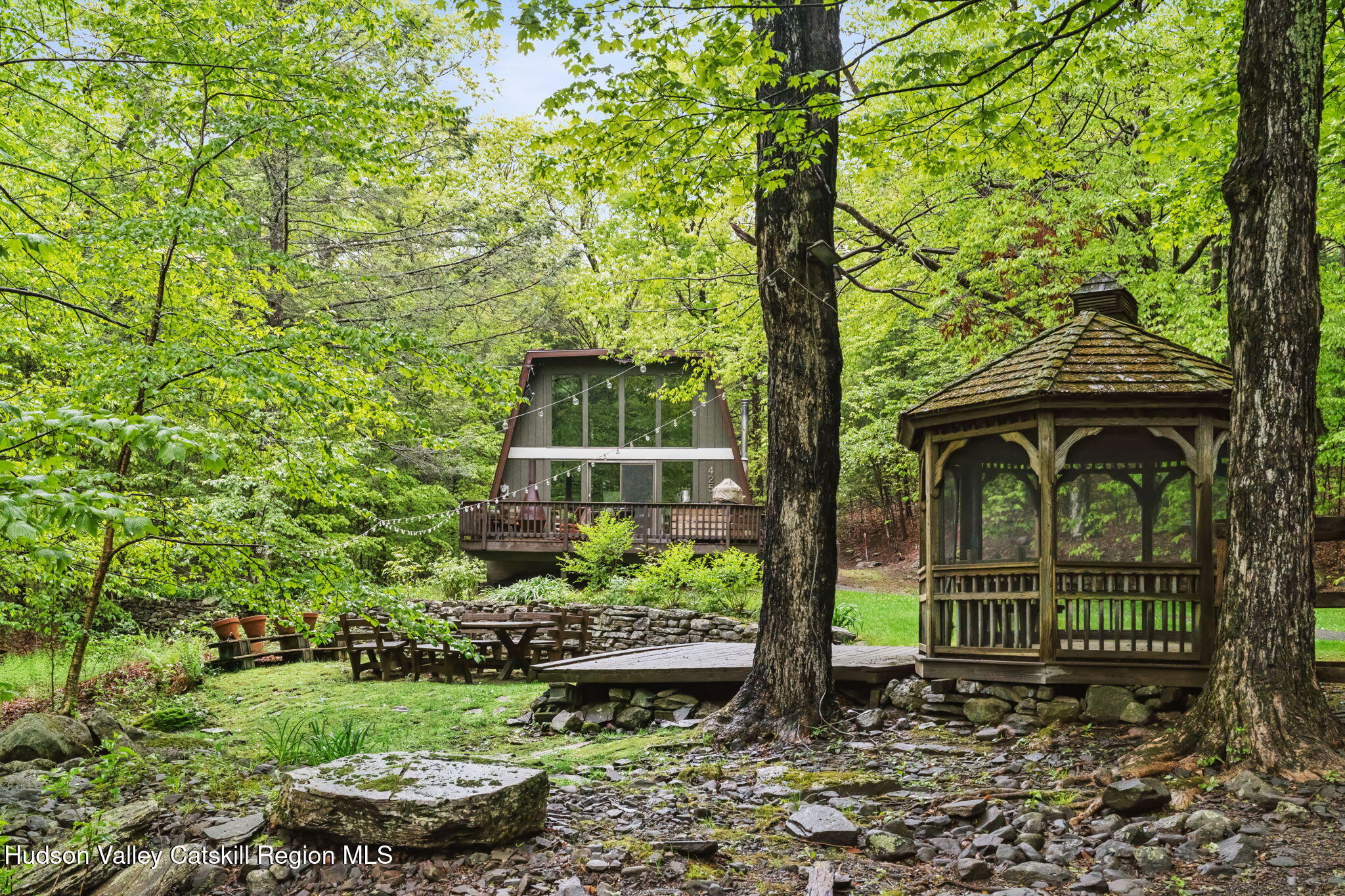 425 North Lake Road Haines Falls, NY 12436 - Photo 1 of 45 a front view of a house with garden
