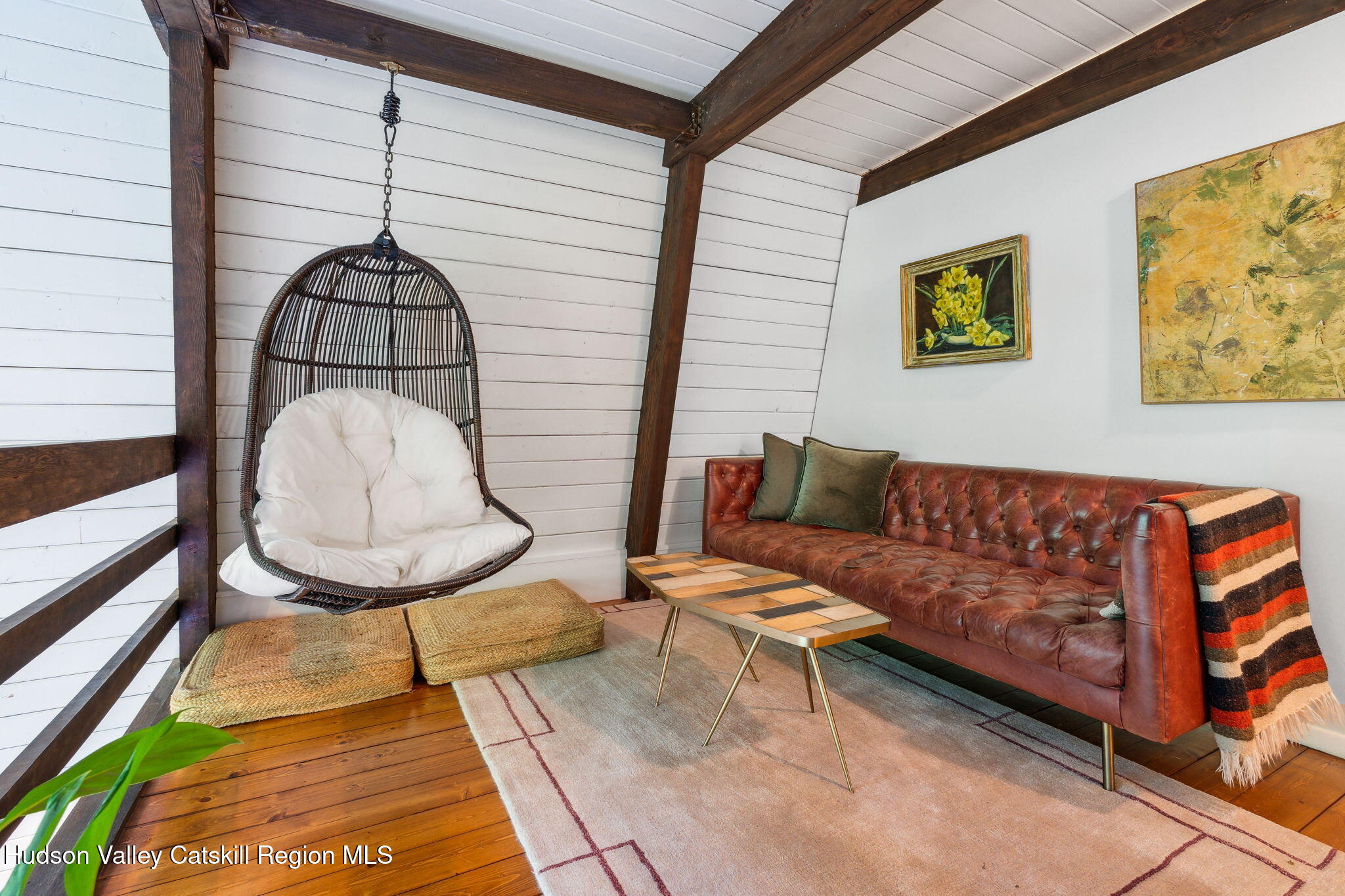 425 North Lake Road Haines Falls, NY 12436 - Photo 13 of 45 a living room with furniture and a gate