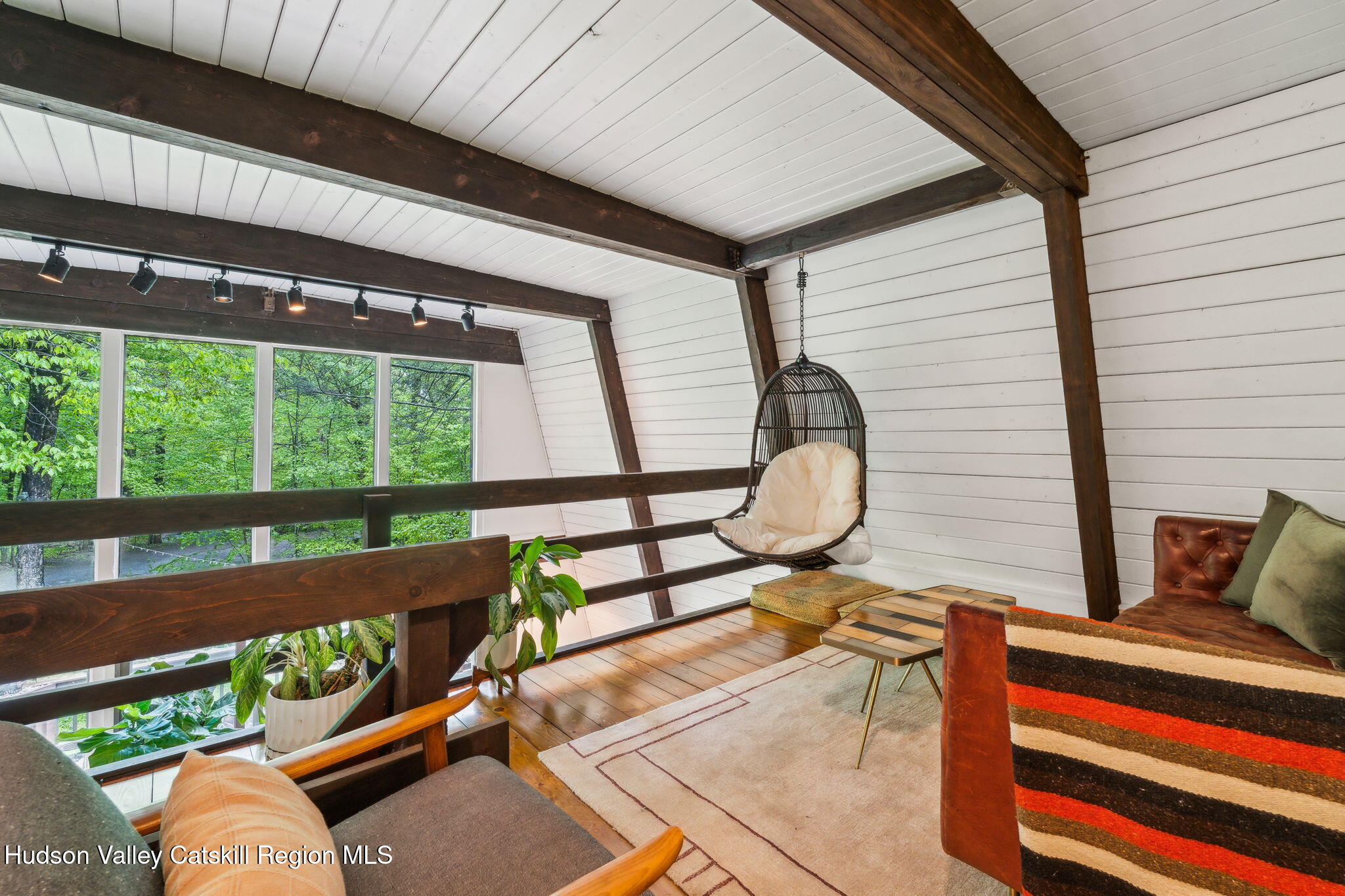 425 North Lake Road Haines Falls, NY 12436 - Photo 14 of 45 a bench sitting in backside of a building