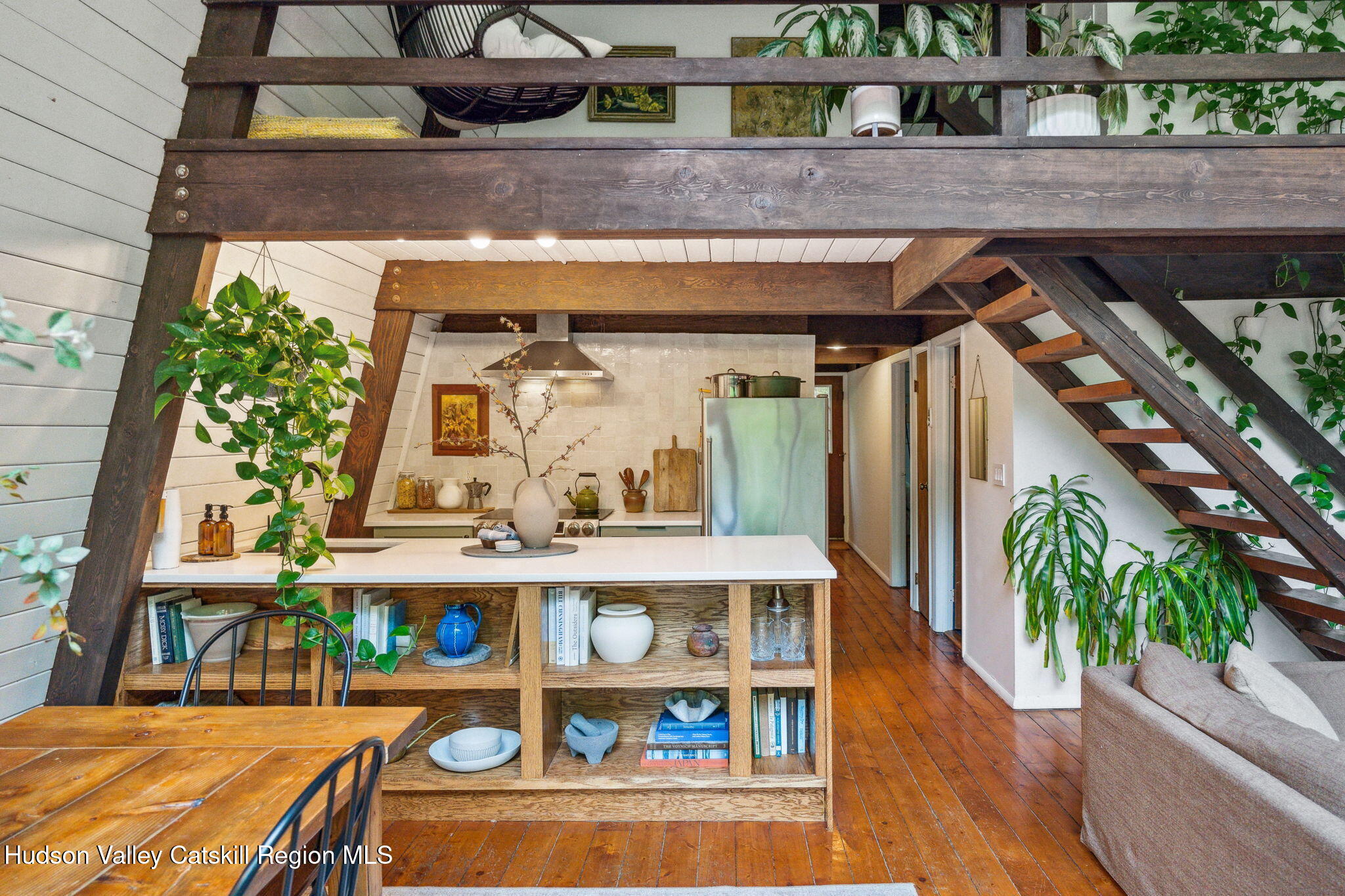 425 North Lake Road Haines Falls, NY 12436 - Photo 3 of 45 a view of store room with wooden floor