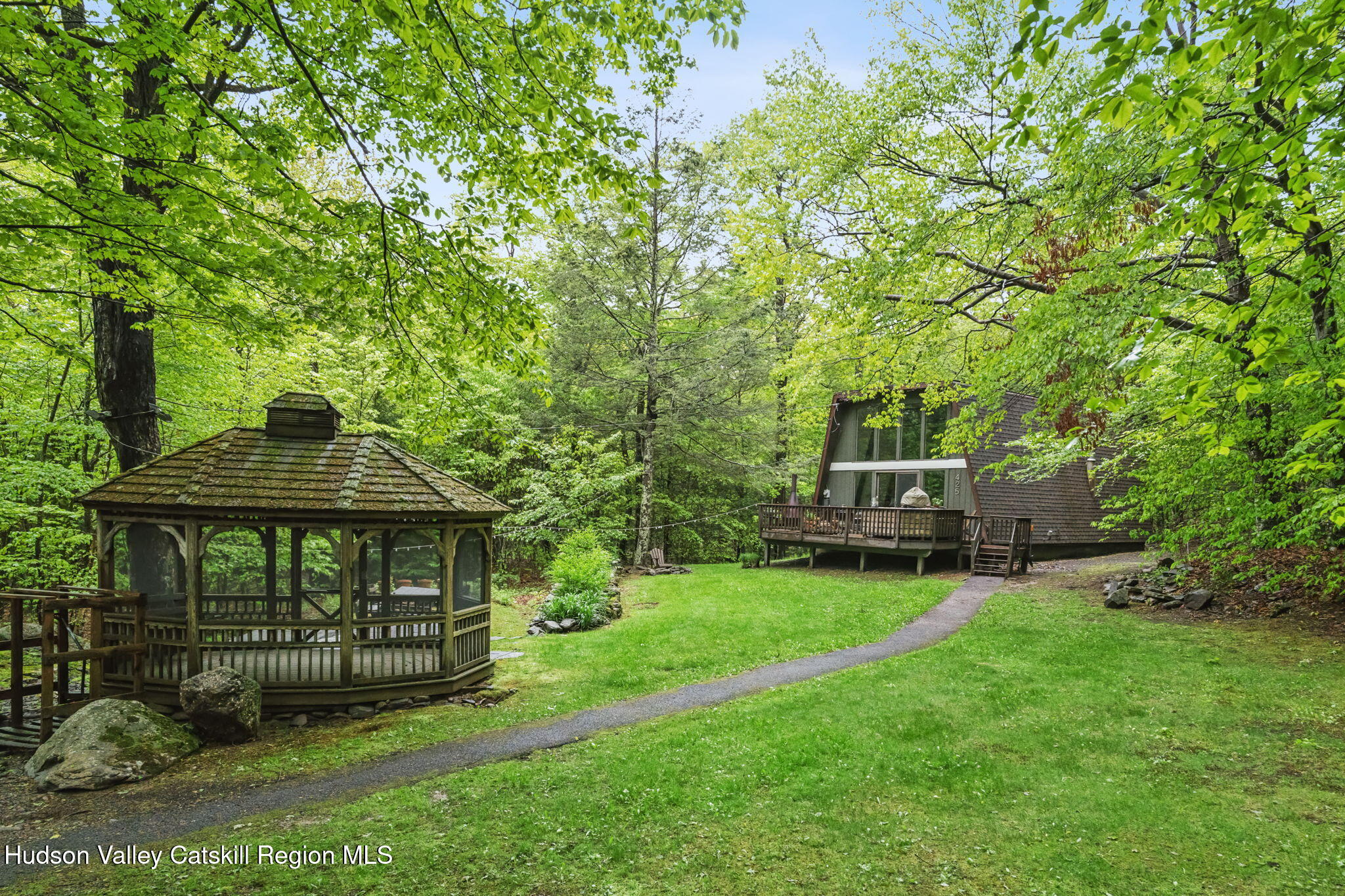 425 North Lake Road Haines Falls, NY 12436 - Photo 37 of 45 a front view of a house with a garden