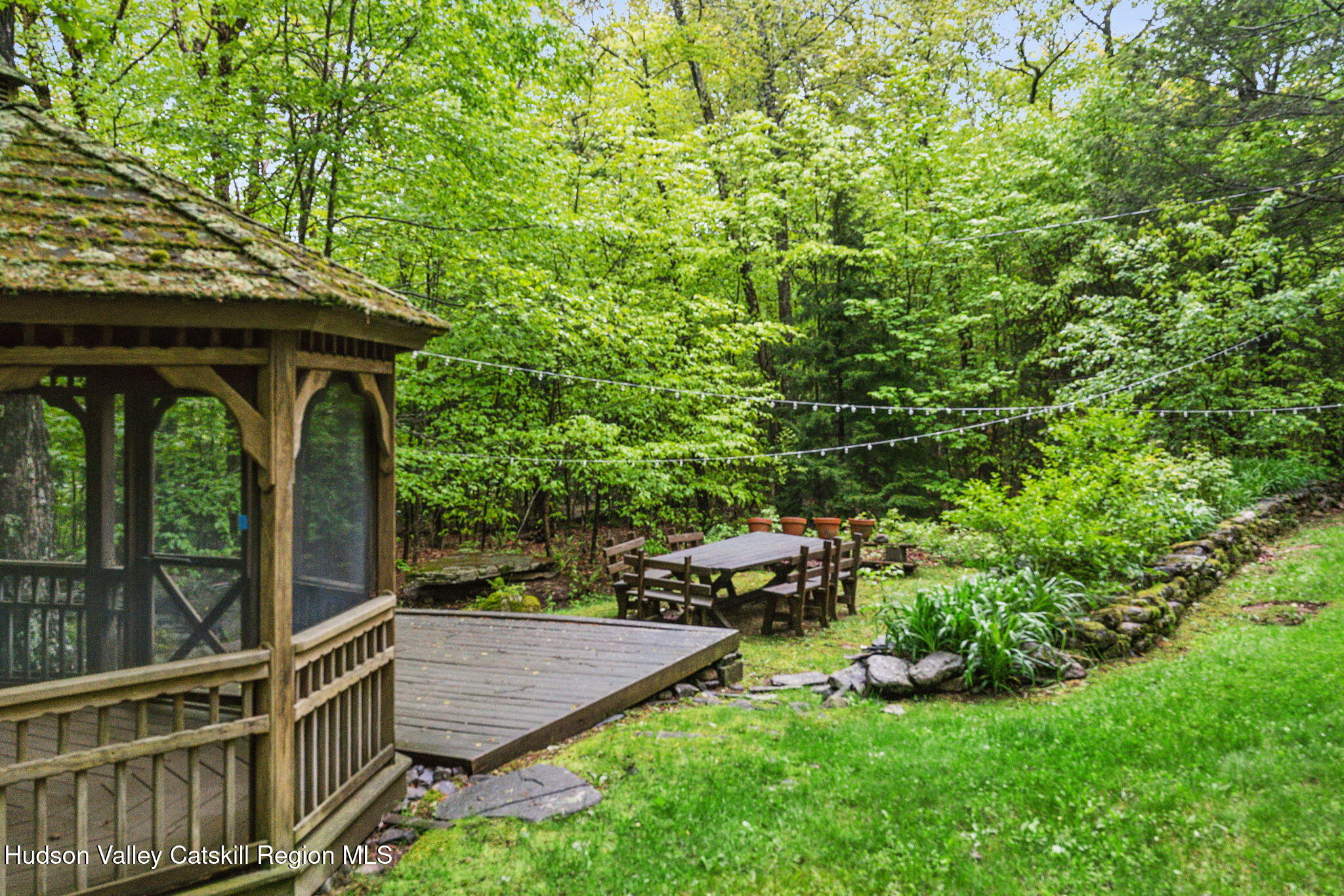 425 North Lake Road Haines Falls, NY 12436 - Photo 39 of 45 a view of a wooden deck with a yard