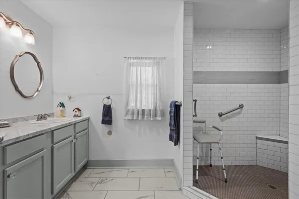 a bathroom with a toilet and shower
