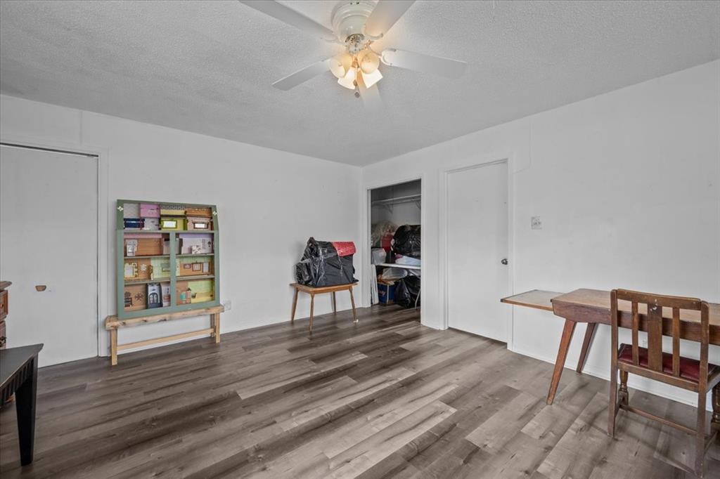 203 Main Street Rosebud, TX 76570 - Photo 24 of 35 a view of a livingroom with furniture and a workspace