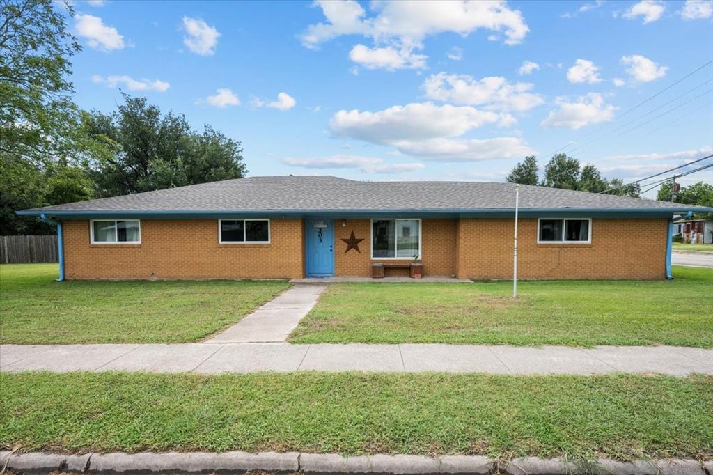 203 Main Street Rosebud, TX 76570 - Photo 28 of 35 a view of a yard in front of a house with a yard
