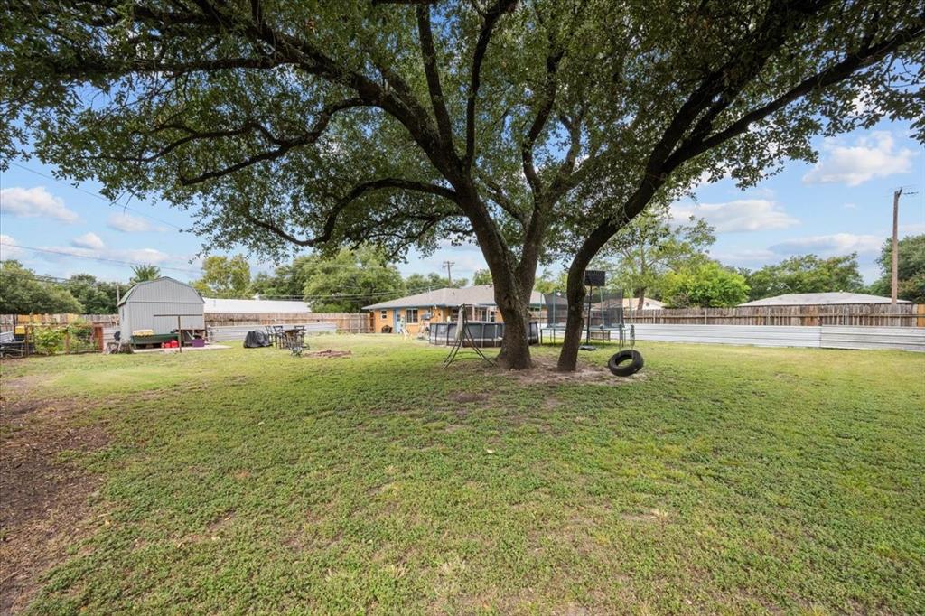 203 Main Street Rosebud, TX 76570 - Photo 33 of 35 a view of a fountain with tree in the background