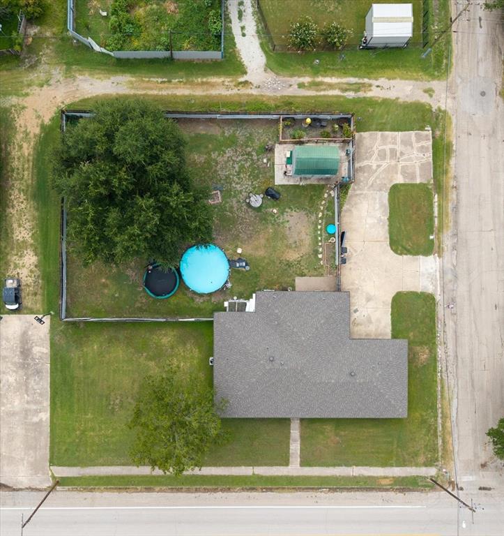 203 Main Street Rosebud, TX 76570 - Photo 4 of 35 an aerial view of a house with a yard