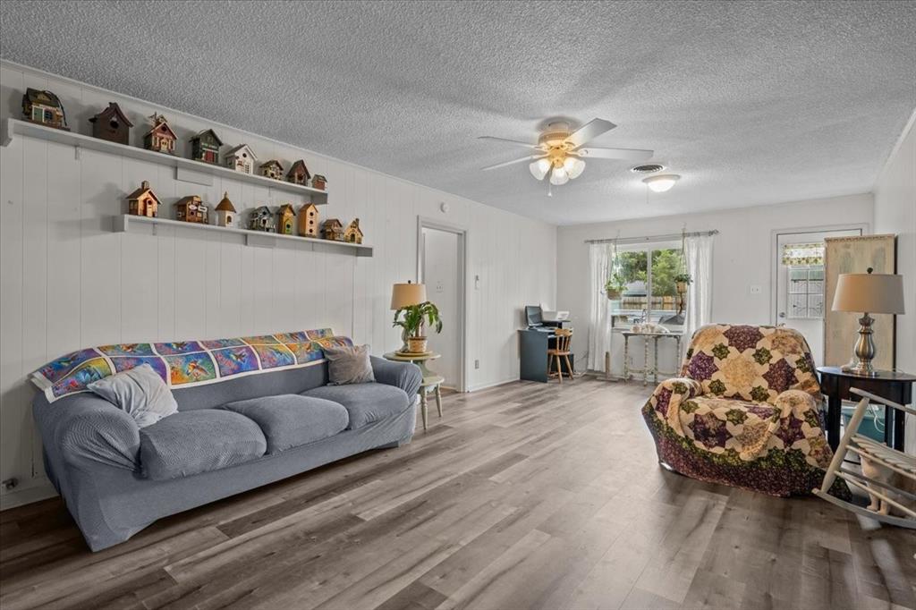 203 Main Street Rosebud, TX 76570 - Photo 9 of 35 a living room with furniture and a window