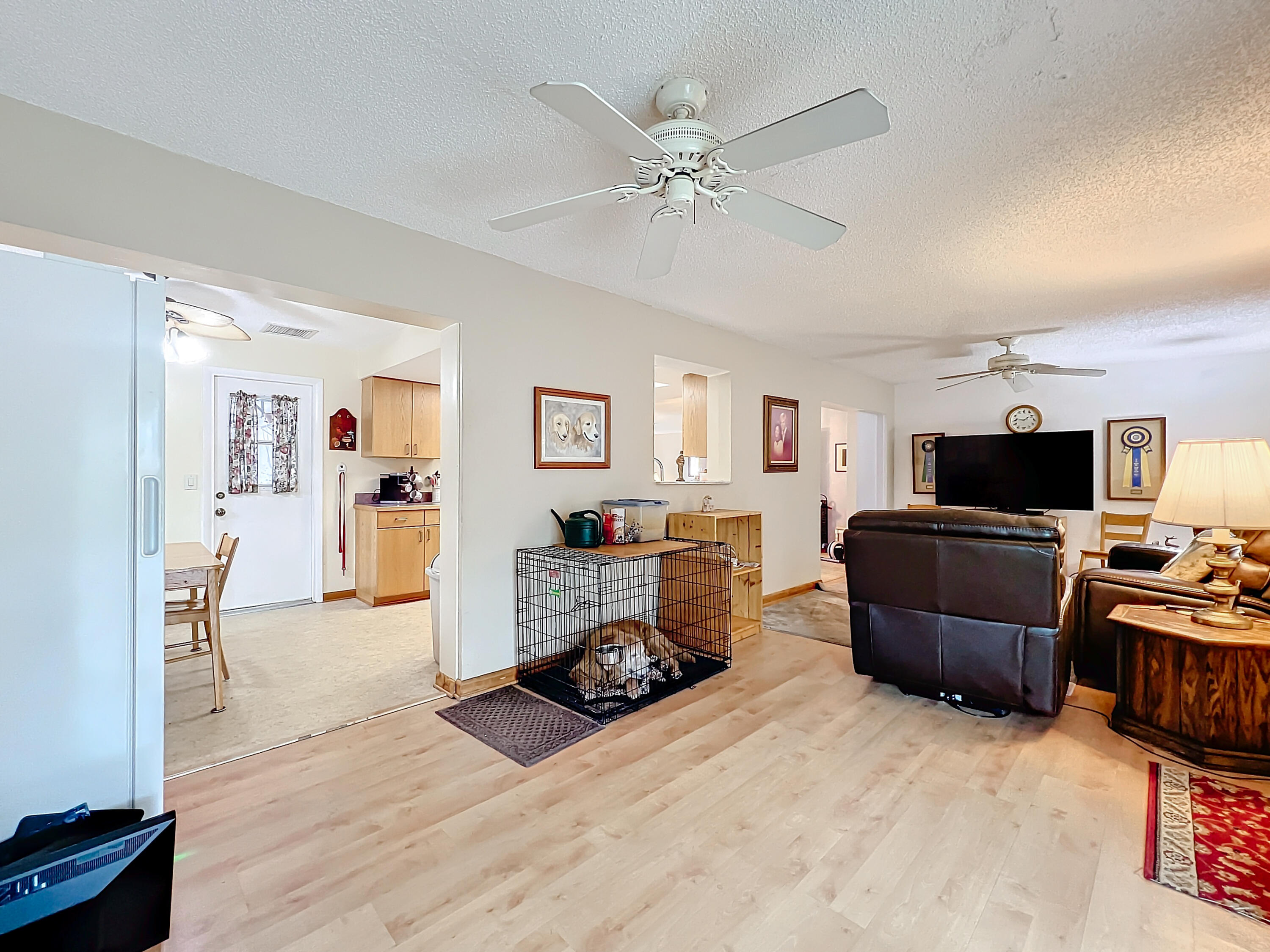 502 Circle East Jupiter, FL 33458 - Photo 24 of 55 a living room with furniture and a flat screen tv