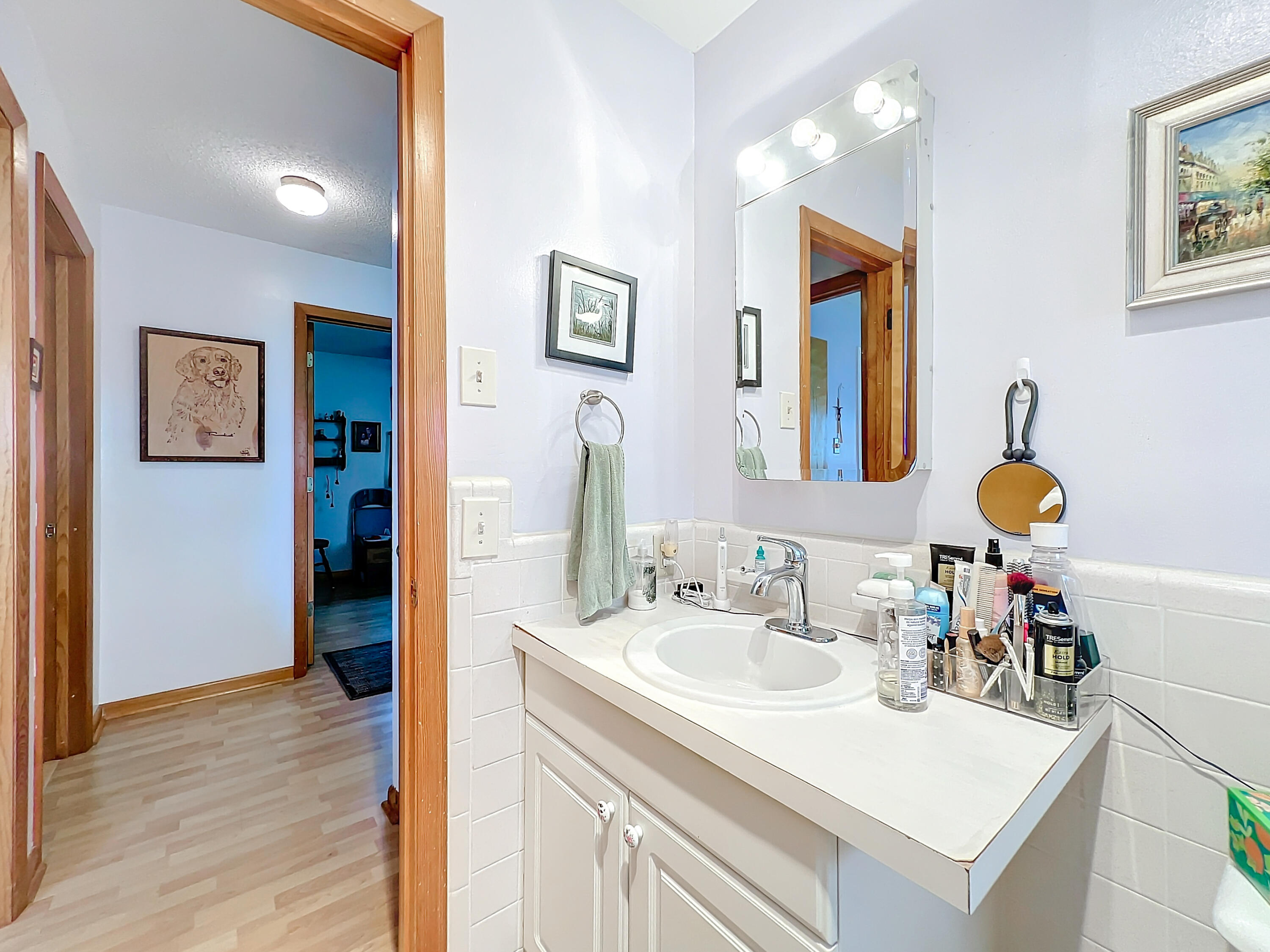502 Circle East Jupiter, FL 33458 - Photo 37 of 55 a bathroom with a sink vanity and a mirror