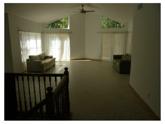 704 Westmore Road Davis, IL 61019 - Photo 3 of 8 a view of entryway and hall with a window